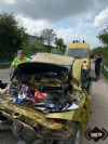Bomberos en el accidente de trfico en la Nacional 634 en Siero.
