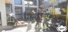 Bomberos en el establecimiento hotelero afectado por el incendio en Ribadesella.