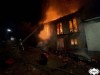 Bomberos en el incendio urbano de Soto de Luia en Cudillero.