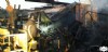 Bomberos trabajando en el incendio urbano de Ribadedeva.