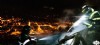 Bomberos de Mieres trabajando en el tejado de la casa incendiada en Seana, Mieres.